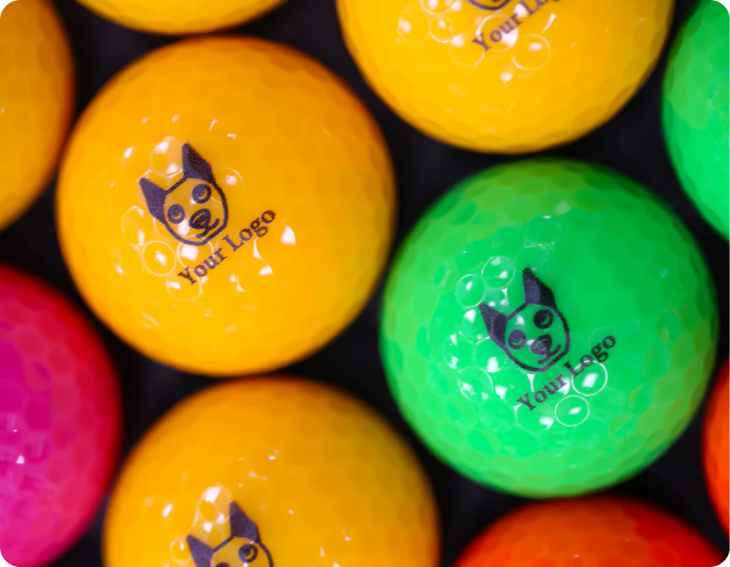 branded mini golf balls with a placeholder logo and text sating 'your logo' balls shown are in yellow green and red