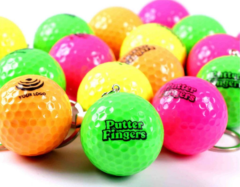 mini golf keyrings branded with the putterfingers logo in a range of colours: yellow, green, pink, orange