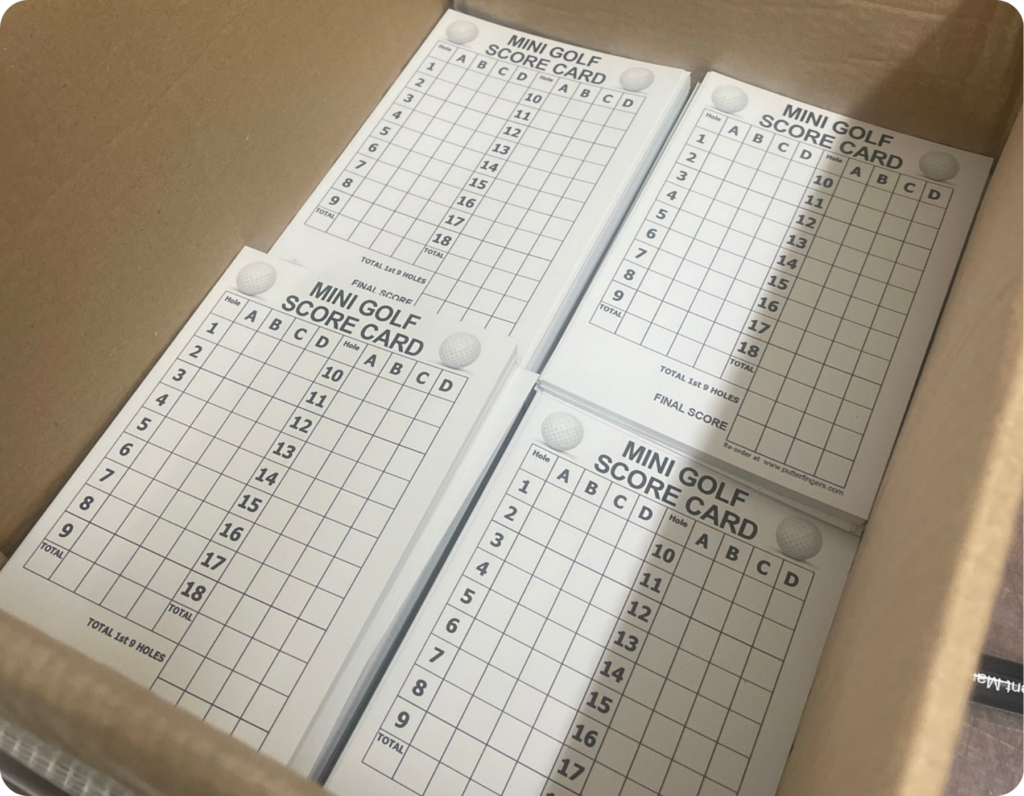 a box of  scorecards 